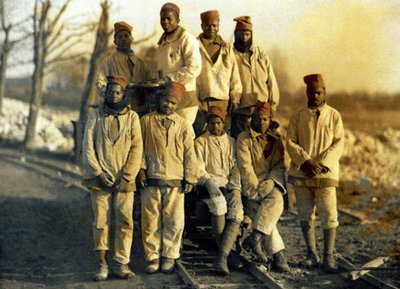 Senegalese workers with a railbike, Ham, Somme, France, 1917 by Fernand Cuville