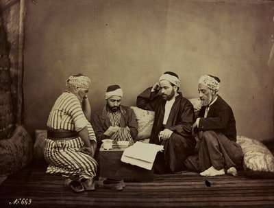 Album Damas et Baalbek: A group of Syrians sitting around a table by Félix Bonfils