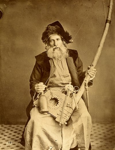 Lebanese Carder Holding His Tools by Félix Bonfils