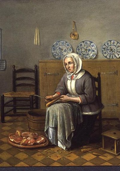 A Seated Woman preparing Food in a Kitchen by Franciscus Carree