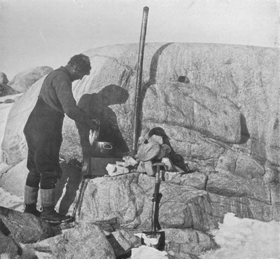 Forde Cooking Seal-Fry on the Blubber Stove at Cape Roberts, c1911, 1913 by Frank Debenham