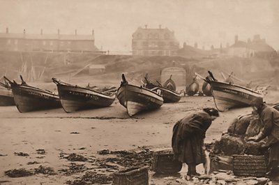 Women loading fish into baskets from the fishing boats, Whitby Harbour by Frank Meadow Sutcliffe