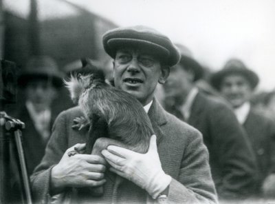 A Black-Crested Mangabey, Possibly Freckles, with His Handler, Taking Part in an Outside Broadcast from London Zoo, 1925 by Frederick William Bond