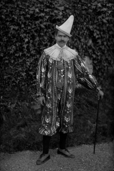 A Man Posing in a Clown Costume by French Photographer