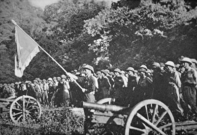 Communist Viet Minh troops on parade with light field artillery, during the siege of Dien Bien Phu, November 1953-May 1954 by French Photographer
