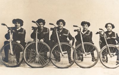 Five girls with their bicycles by French Photographer