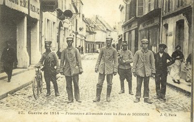 German prisoners on the streets of Soissons, France, World War I by French Photographer