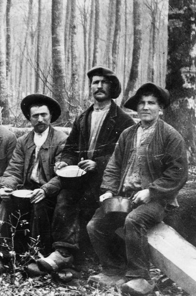 Lunch of a team of loggers, late 19th century. by French Photographer