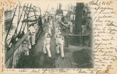 Trainee sailors at a French naval school having a boxing lesson on deck by French Photographer