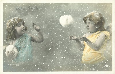 Two Girl Angels Throwing Snowballs at Each Other by French Photographer