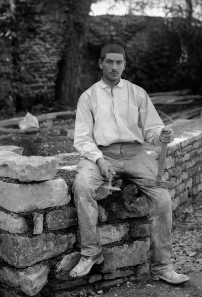 Young man employed in the restoration of the Abbey of Septfontaines, near Bourmont in Haute-Marne, around 1880. Photography. Ducos Collection. by French Photographer