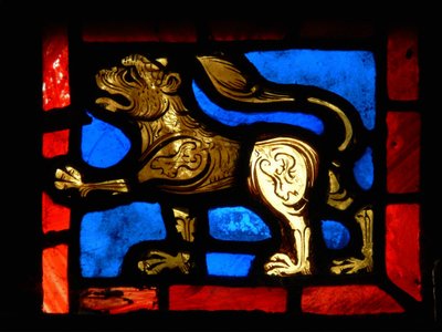 A corner piece depicting a lion, from the Passion window by French School