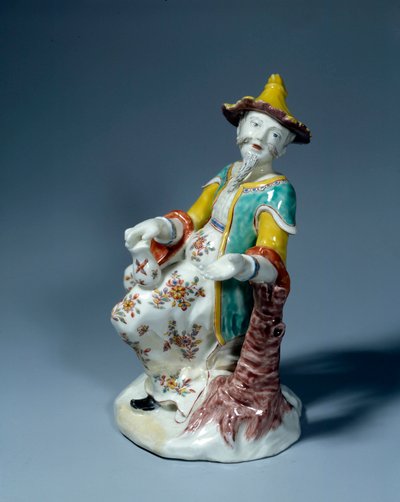 Art France: Chinese figure. Polychrome porcelain sculpture of Saint Cloud by French School