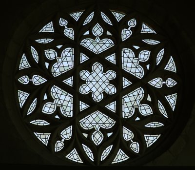 The rose window on the east wall of the south transept by French School