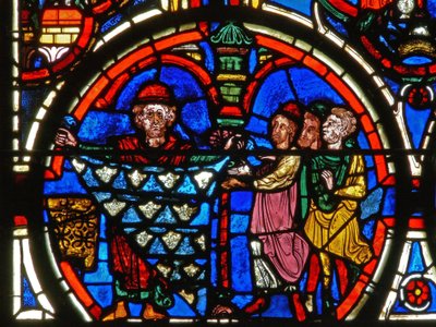 Detail from a window depicting the Passion: donors and the furriers by French School