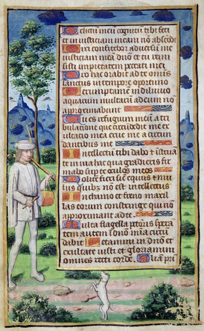 Fol.50v Page of text with a border detail of a musician making his dog dance, from 