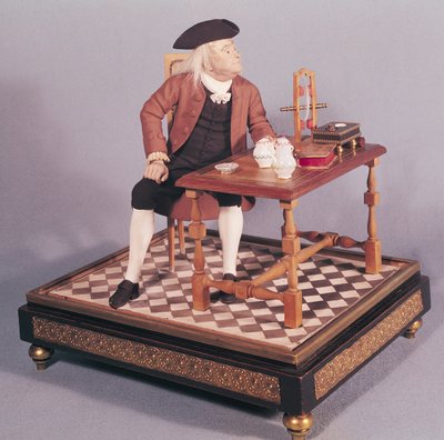 Model of Benjamin Franklin (1706-90) at his table, late 18th century by French School