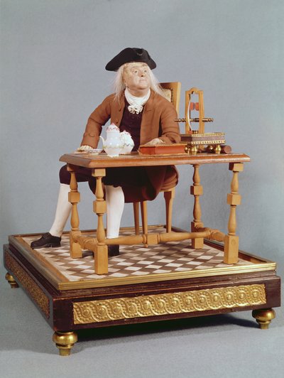 Model of Benjamin Franklin (1706-90) at his table, late 18th century by French School