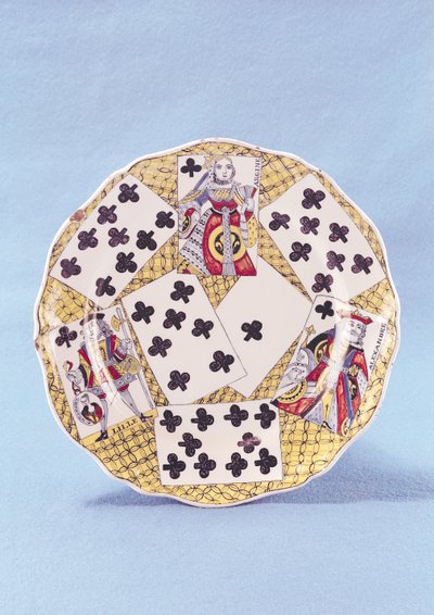 Plate decorated with a trompe l