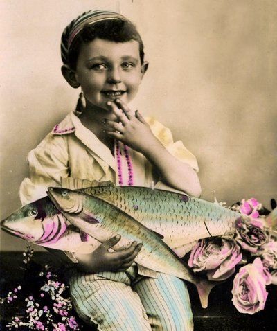 Portrait of a boy holding a fish c.1898 by French School