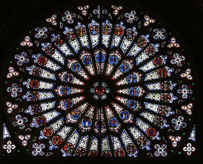 Rose window depicting Christ surrounded by the twelve Apostles and Evangelist symbols by French School