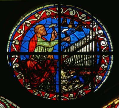 Rosette window depicting an organ and bells by French School