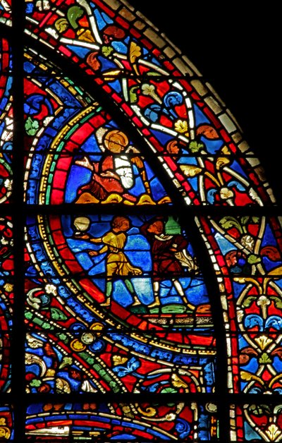 The Prodigal Son window: butlers serve the meal; an angel by French School