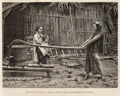 The rice mill, in front of a farmer