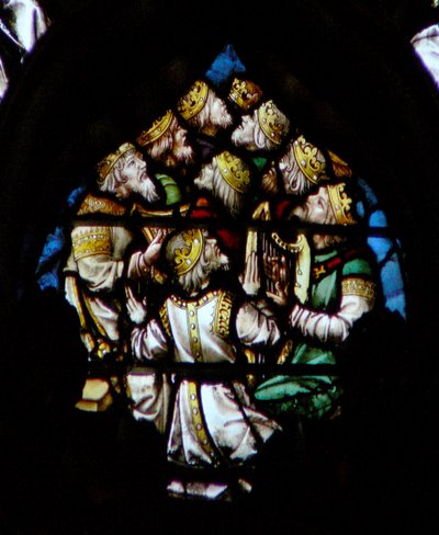 The west rose window depicting a scene from the Book of Revelation: Some of the twenty four elders with musical instruments by French School