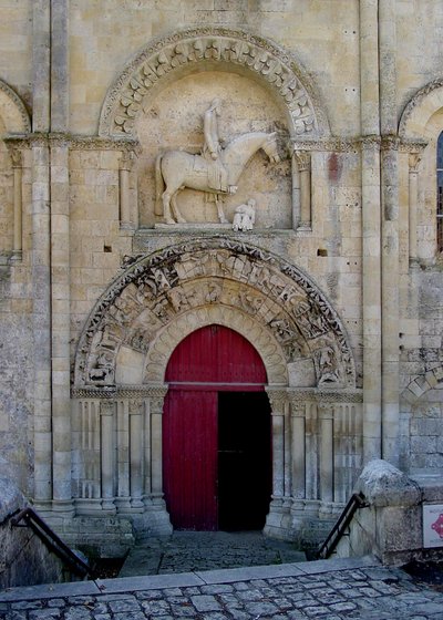 View of the north portal of the Church of St. Hilaire by French School