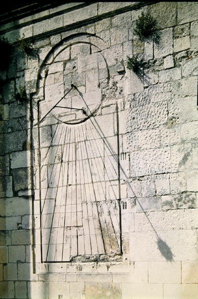 View of the sundial on the facade of the Hotel de Ville by French School
