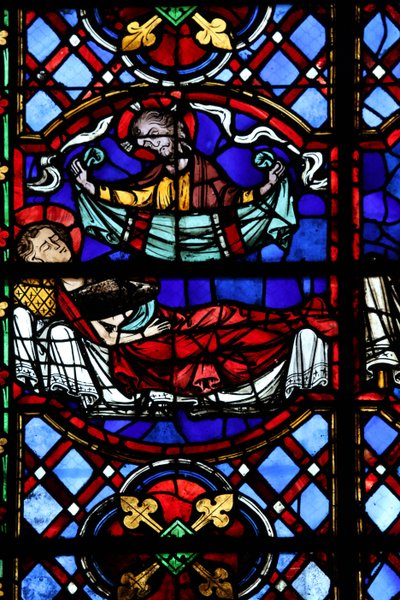 Window depicting the Charity of St Martin: he divides his cloak and this is returned by Christ by French School