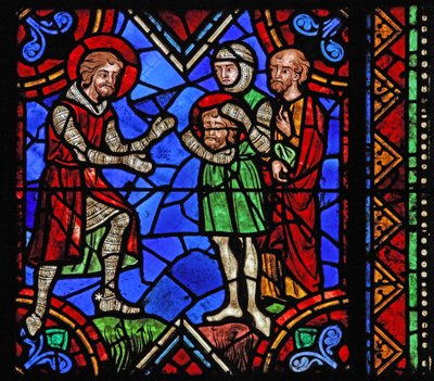 Window depicting St Julian of Brioude story - St Ferreol, a friend of Julien, who died during the Diocletian persecutions, receives Brioude