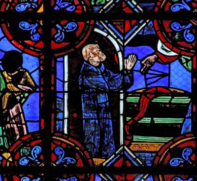 Window depicting the miracle of the full wine barrel at the foundation of St Julien