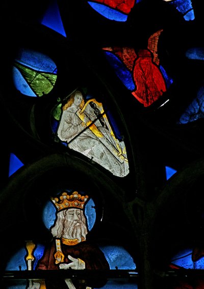 Window depicting a musician angel with a harp by French School