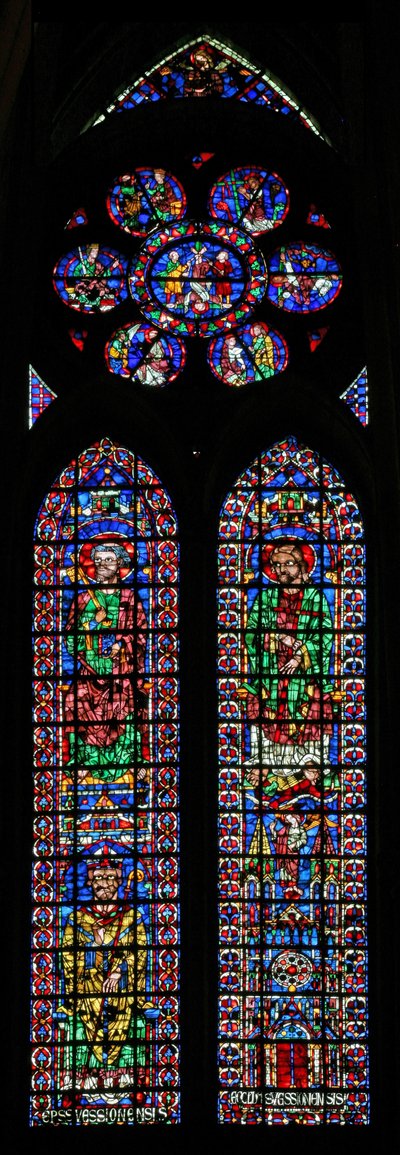 Window w102 depicting St Peter and St Andrew; Soissons Cathedral and a Bishop; in the rose Scenes from the life of St Peter by French School