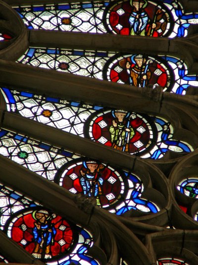 Window w121 depicting bishops, kings, martyrs in a section of the rose window by French School