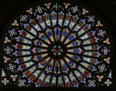Window w121, the north rose window, depicting Apostles, Evangelists, bishops, kings, martyrs, St Peter and St Paul (rose window - internal) by French School