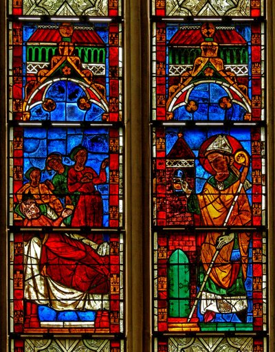 Window w13 depicting a scene from a legend of St Nicholas: Three Girls are saved from prostitution by the saint