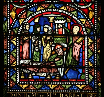 Window depicting the Meal at Simon