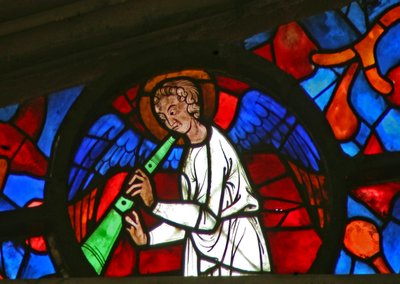 Window w141 depicting a musician angel with a shawm by French School