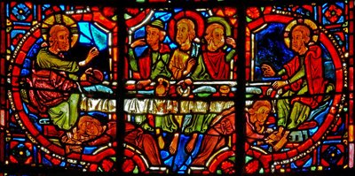 Window w17 depicting a scene from the life of St Mary Magdalene - the saint washing Christ