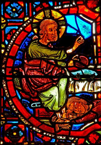 Window w17 depicting a scene from the life of St Mary Magdalene - the saint washing Christ