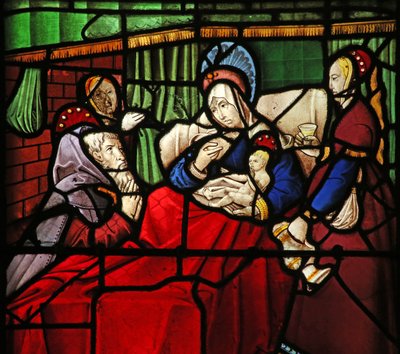 Window depicting the Life of St Remi. The saint-hermit Montan is miraculously healed by the milk applied by the saint to his eyes by French School