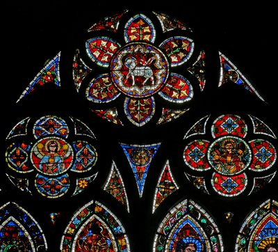 Window w202 depicting the tracery lights with two angels and the Agnus Dei by French School