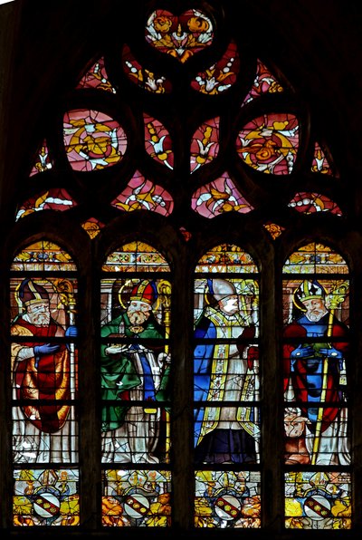 Window depicting St Hilarire, an unidentified saint, St Exupery, St Sernin by French School