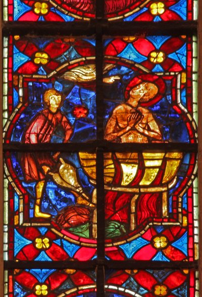 Window depicting a scene from the legend of St John: the saint is plunged into boiling oil by French School