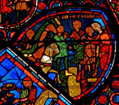 Window w24 depicting a scene from the story of Joseph: his brothers arrive and Joseph embraces Benjamin by French School