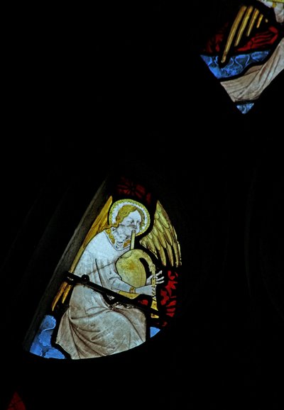 Window depicting a musician angel with cornamuse by French School