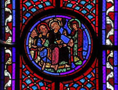 Window w2 depicting a scene from the life of St Mary Magdalene - the saint tells the disciples of the Resurrection by French School